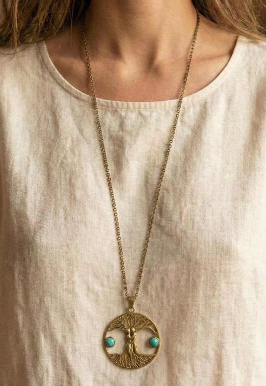 Large pendant of a beautiful couple with two turquoise stones