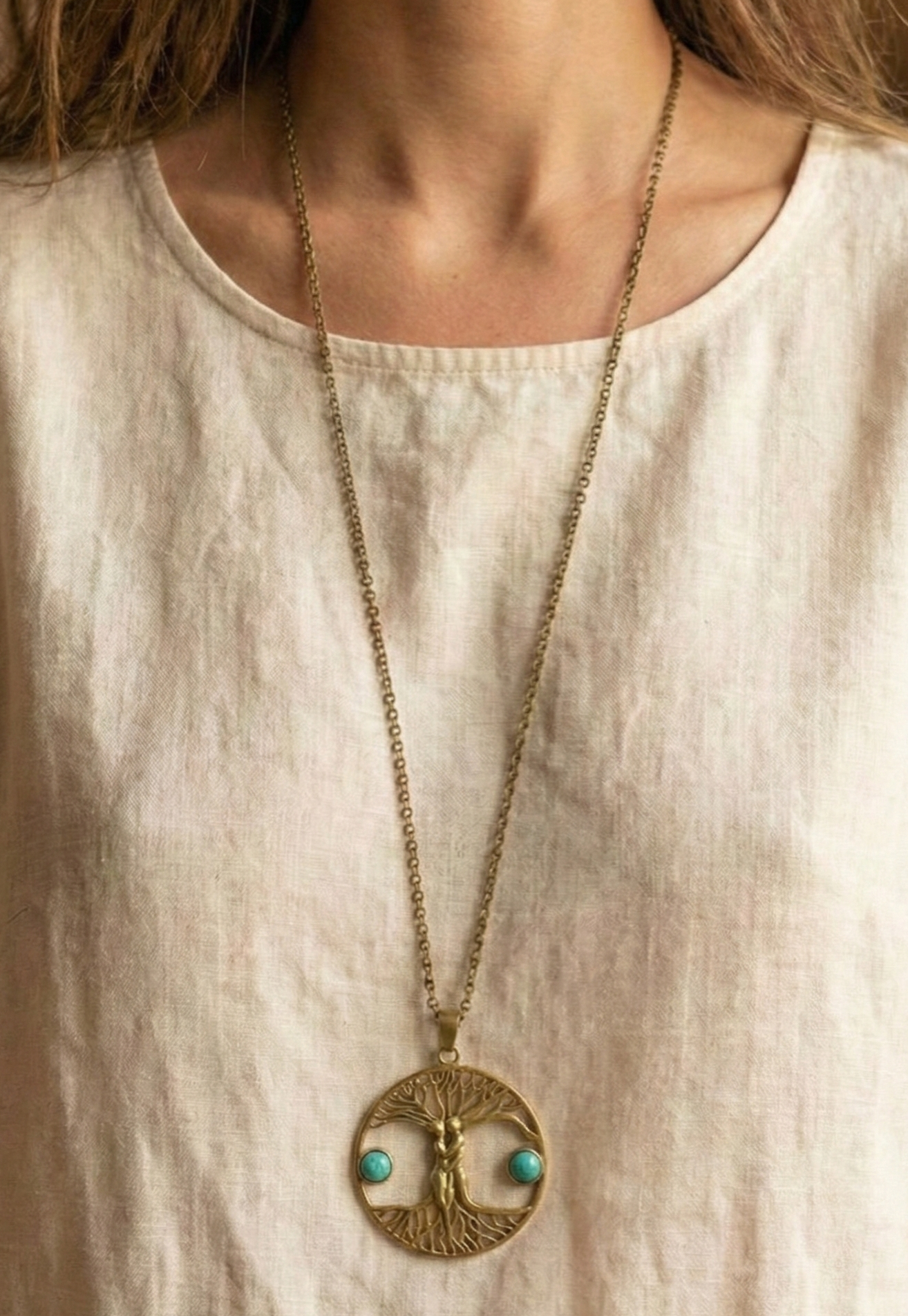 Large pendant of a beautiful couple with two turquoise stones